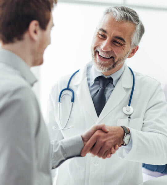 Doctor Shaking Hands with Patient